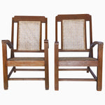 A pair of vintage wooden chairs with cane backs, the John Robshaw Chair With Slanted Back. - 29225408725038