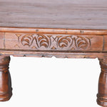 A John Robshaw Round Wooden Carved Bajot coffee table made of hardwood with intricate carvings, providing an antique charm. - 29224433975342