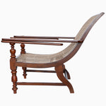 A John Robshaw Teak Wooden Planter Chair 2 chair with a wicker frame and a rattan seat. - 30296352391214