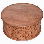 A Round Wooden Jali Table with intricately carved sides from John Robshaw. - 30280699215918