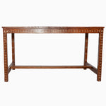 An antique John Robshaw dining table made of Indian hardwood with studded legs. - 30273400274990