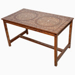 An antique John Robshaw wooden table with Indian hardwood and a beautiful ornate design. The table features exquisite bone inlay detailing, adding a touch of elegance to any space. - 30273398505518