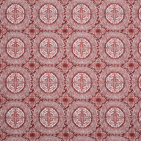 A red and white block print pattern on Kala Teak fabric by John Robshaw.
