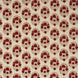 A red and beige floral pattern on a white background, created using traditional craftsmanship using the Kukkuta Teak Fabric by John Robshaw.