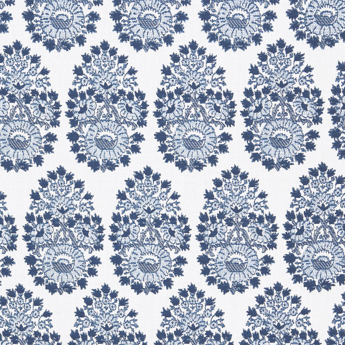 A blue and white paisley pattern on a white background featuring block prints, the Lanka Azure Performance Fabric by John Robshaw.