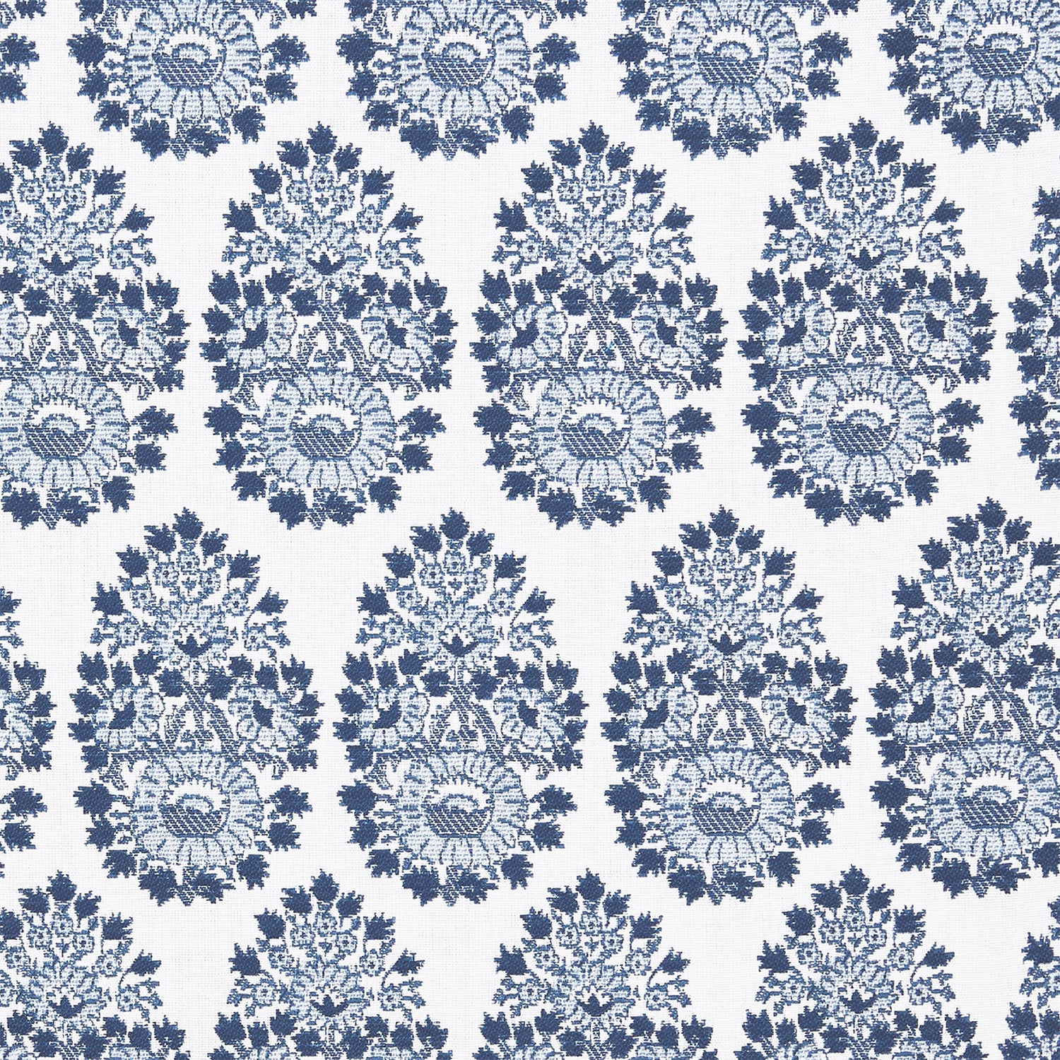 A blue and white paisley pattern on a white background featuring block prints, the Lanka Azure Performance Fabric by John Robshaw.