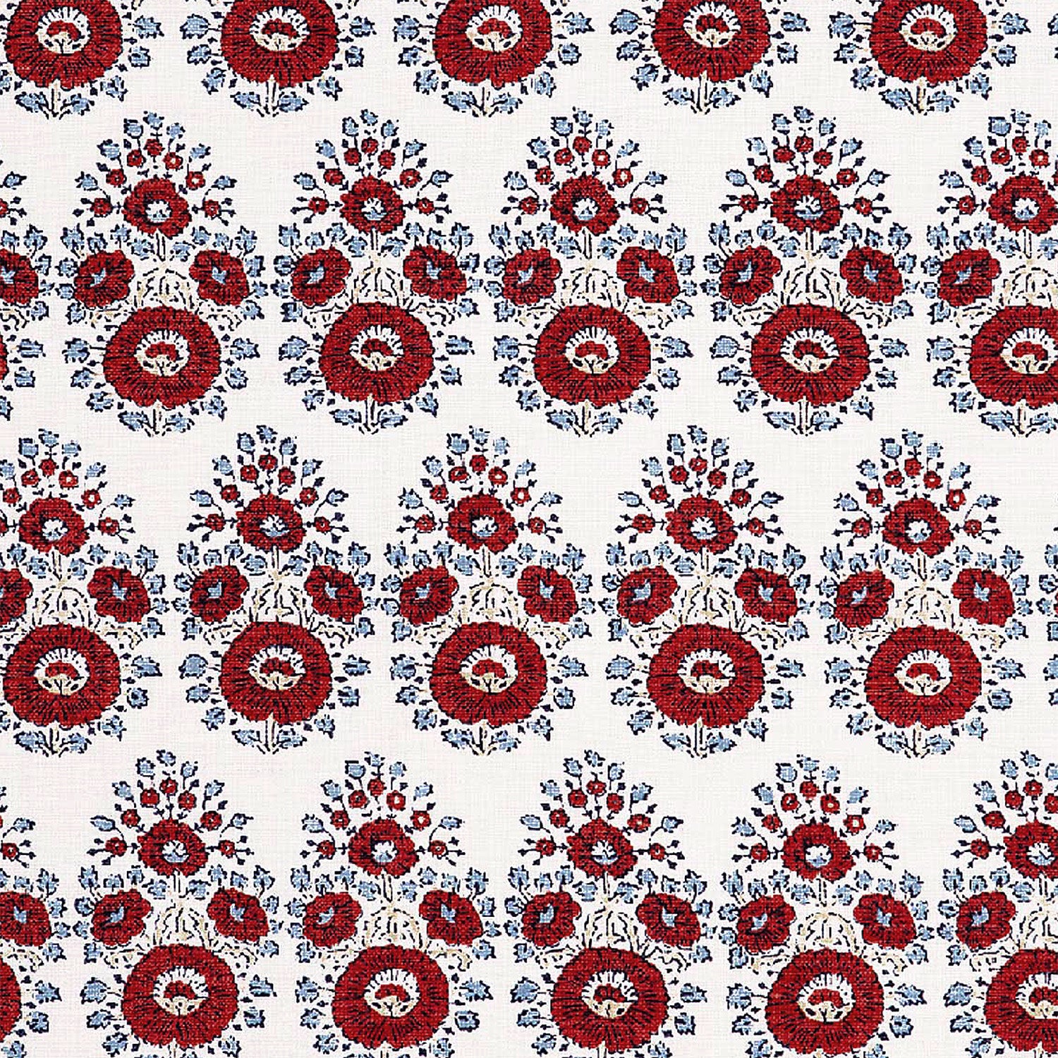 A hand block printed Lanka Coral Fabric with a red and blue paisley pattern on a white background, showcasing traditional craftsmanship, from the brand John Robshaw.