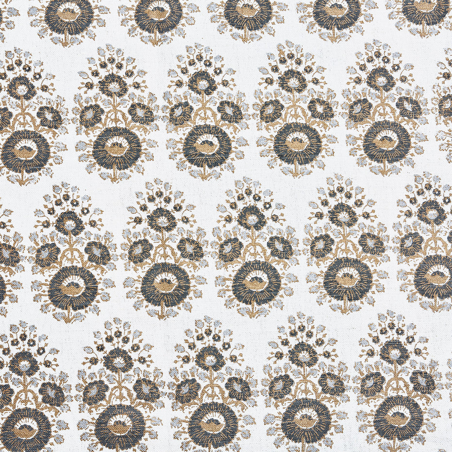 A black and gold paisley pattern on a white background, showcasing the exquisite traditional craftsmanship of John Robshaw's Lanka Metallic Fabric hand block printed fabrics.