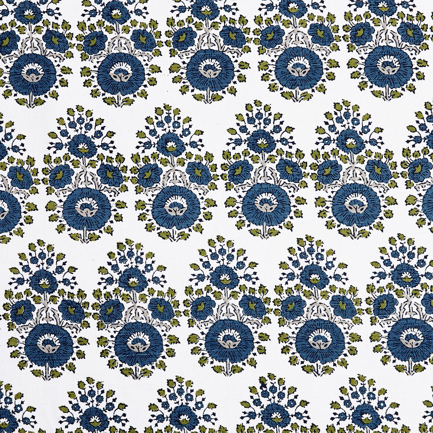 A blue and green floral pattern on a white background featuring traditional craftsmanship of the Lanka Peacock Fabric by John Robshaw.