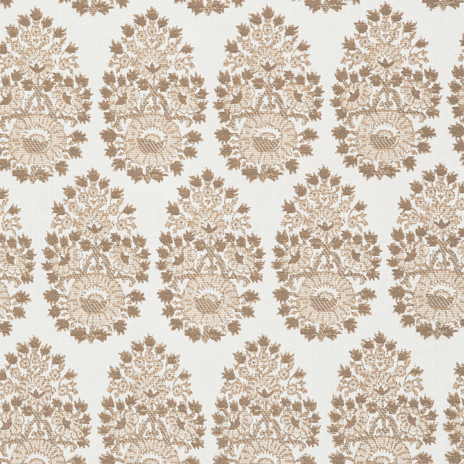 A beige and brown paisley pattern on a white background, featuring block prints is showcased on the Lanka Sand Performance Fabric by John Robshaw.