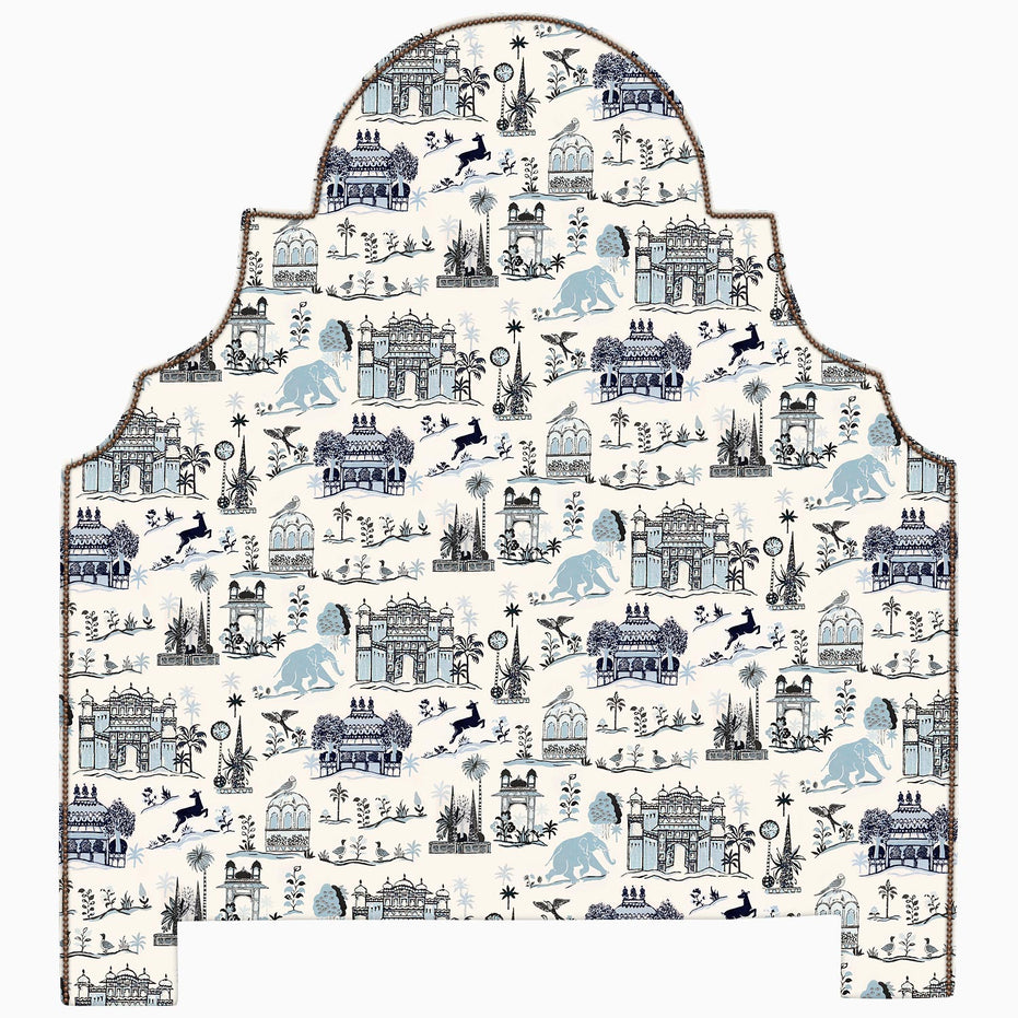 A Custom Dara Headboard by John Robshaw with a blue and white pattern available for shipping.