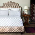 An ornate Layla Gray Quilt from Quilts & Coverlets adorns a cotton voile bed. - 30262777839662