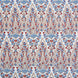 A beautiful blue and red floral pattern resembling the blooming gardens of Mughal, hand block printed on a pristine white background using the Marmar Coral Fabric by John Robshaw.