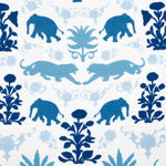 A Panav Outdoor Pillow by John Robshaw, a blue fabric with elephants on it, perfect for an outdoor pillow. - 29995407179822