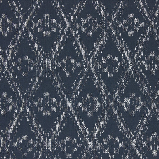 A blue and white Ramati Azure Performance Fabric with a diamond pattern, inspired by Thai ikats, by John Robshaw.
