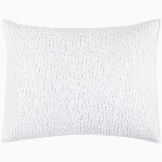 An Organic Hand Stitched White Quilt from John Robshaw with a cotton voile coverlet on a white background.