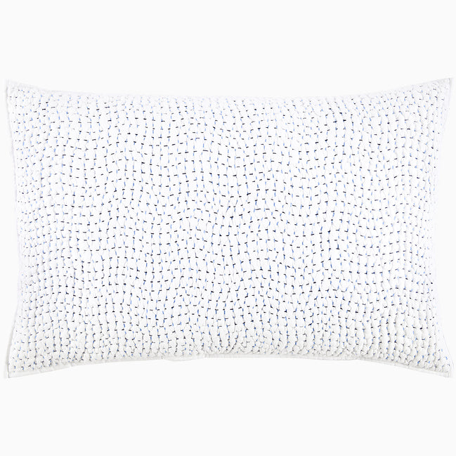 A John Robshaw Organic Hand Stitched Light Indigo Quilt with blue dots.