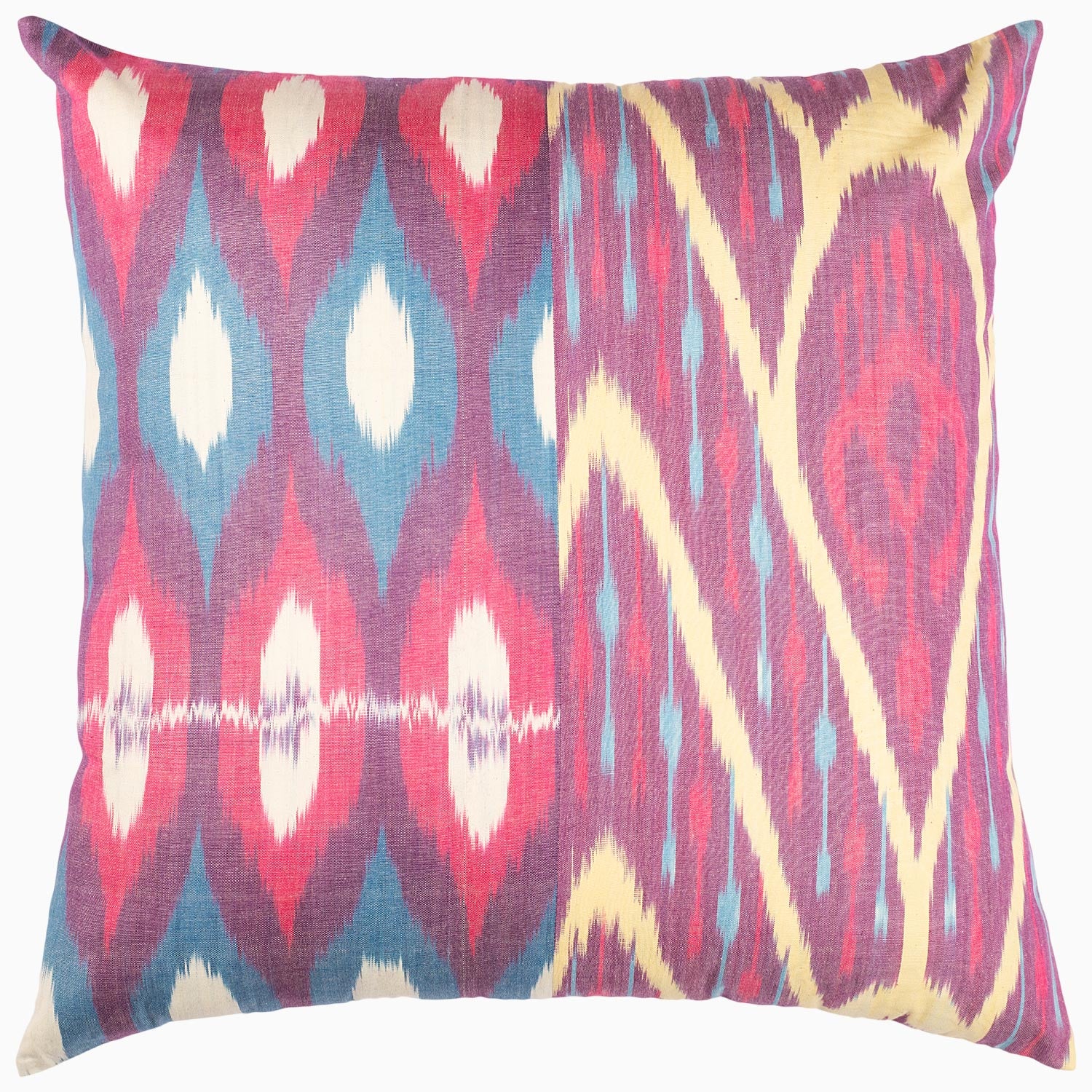 A Diamond Octagon Ikat Pillow by John Robshaw with a pink, blue and yellow design.