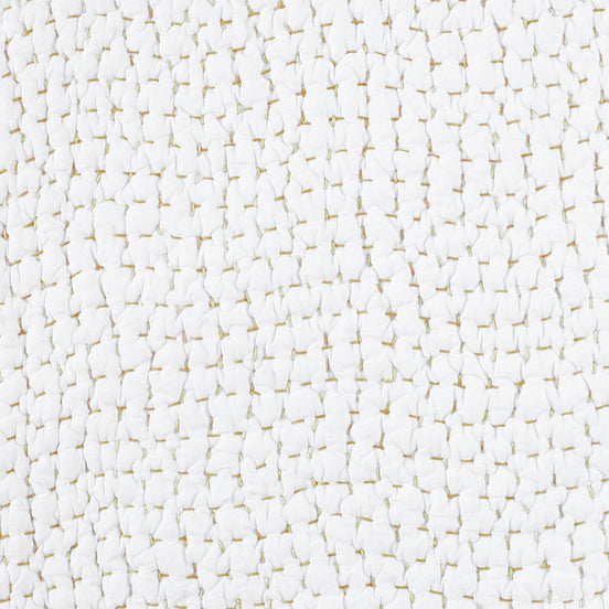 A close up image of a John Robshaw Organic Hand Stitched Sand Quilt Swatch featuring hand stitching.