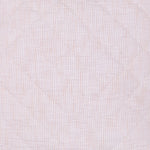 Close-up image of a reversible Sagana Lotus Quilt made from cotton slub fabric. - 29553876500526
