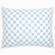 A Layla Azure Quilt pillow by John Robshaw with a blue and white geometric pattern.