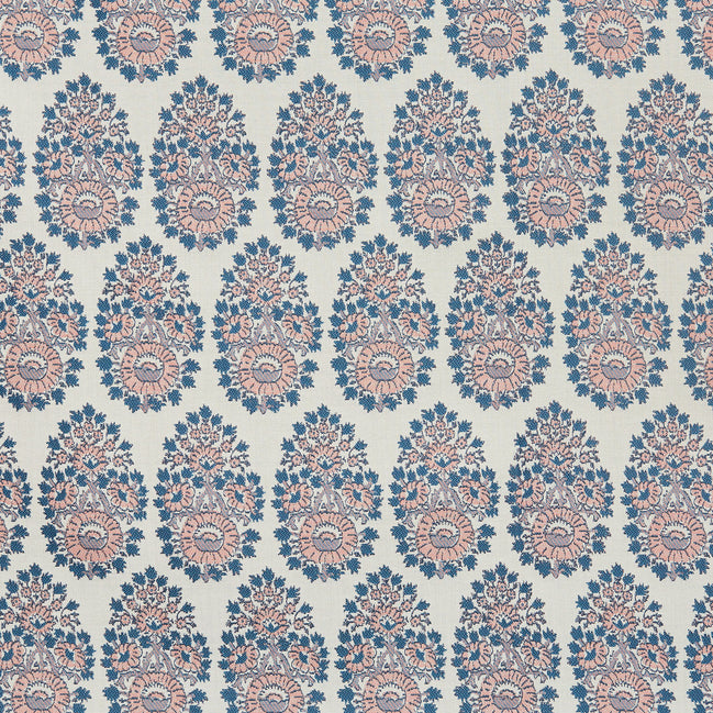 A blue and pink paisley pattern on a white background that showcases the Lanka Primrose Performance Fabric by John Robshaw, which highlights fabric-making traditions.