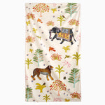 A Masai Mara beach towel with elephants and trees on it, inspired by Kenya safari towels from John Robshaw. - 30253822345262