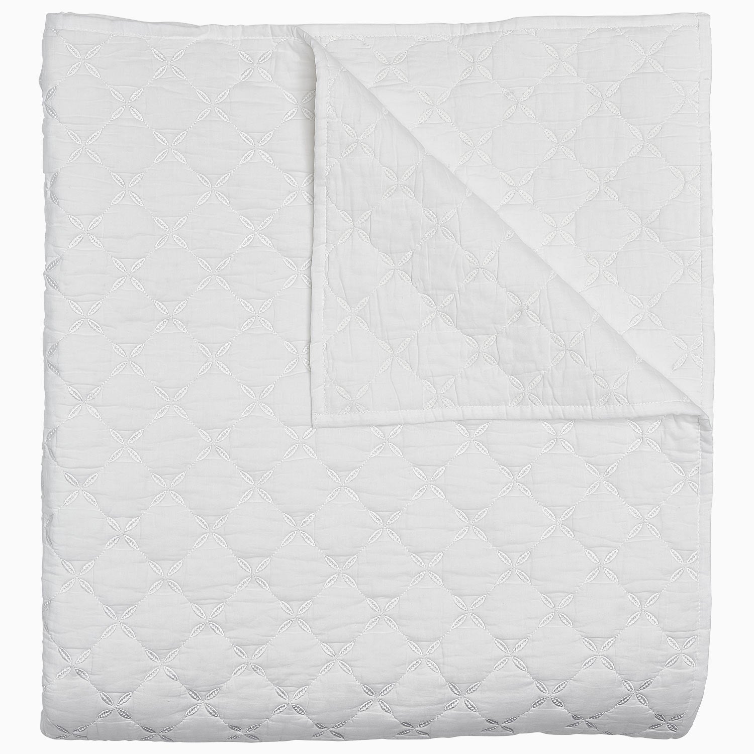A Layla White Quilt by John Robshaw on a white background.