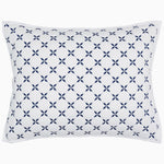 A Layla Indigo Quilt by Quilts & Coverlets, a blue and white pillow with a cross design on it, made of cotton voile. - 28766400708654