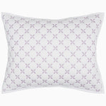 A Layla Lavender Quilt pillow with a cross design, made from cotton voile, by John Robshaw. - 28766508384302