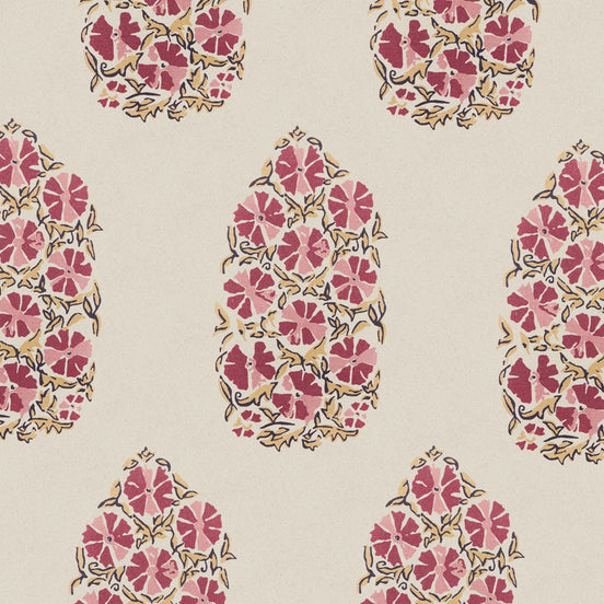 A pink and yellow floral pattern on an oversized beige background, featuring the Saanya Berry Fabric by John Robshaw.