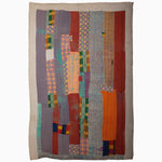 A colorful Night Out patchwork quilt, handmade in India, hanging on a wall by Vintage Blankets. - 28869352063022