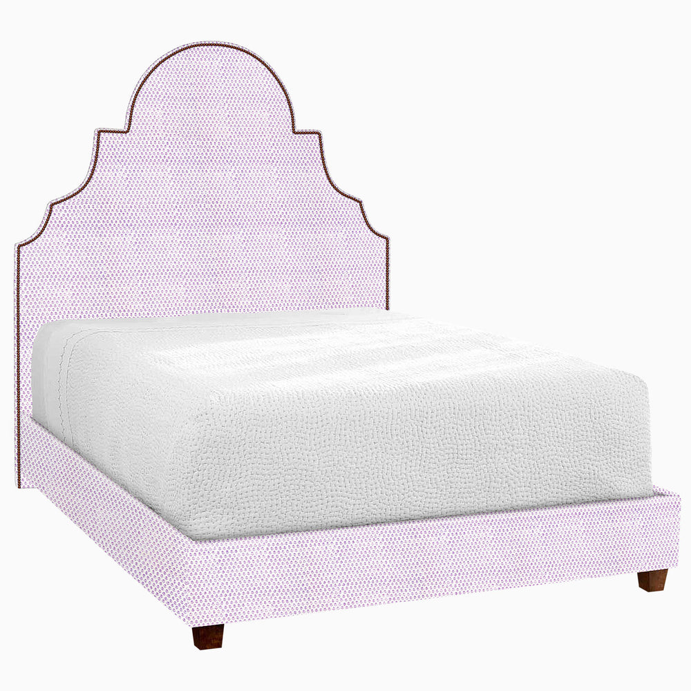 A Custom Dara Bed with a pink upholstered headboard and footboard available for shipping. Brand: John Robshaw