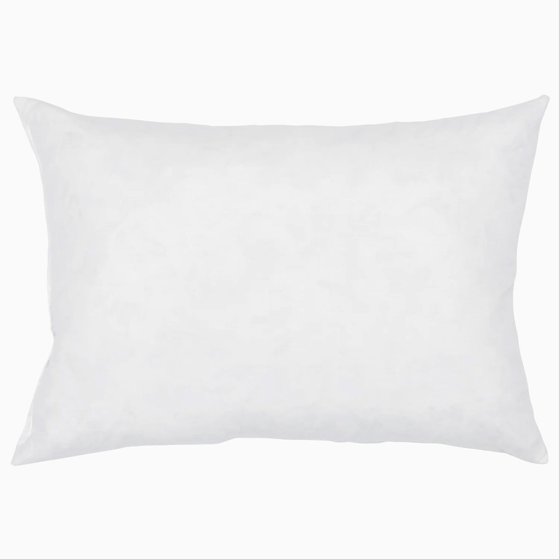 A hypo-allergenic John Robshaw white pillow on a white background.
