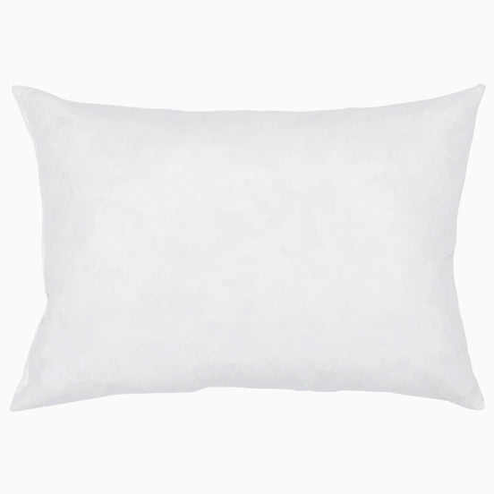 A hypo-allergenic John Robshaw white pillow on a white background.