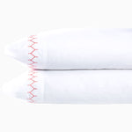 A pair of white Stitched Coral Organic Sheets with embroidered designs, by John Robshaw. - 30273362657326