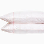 A pair of Poseti Lotus Organic Sheet Set pillows made with organic cotton on a subtle white background. - 30252461686830