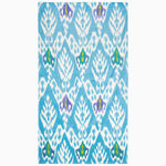A Umida Ikat Blue Beach Towel by John Robshaw on a white background. - 30253927137326