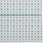 A teal and white Sag Harbor Peacock Organic Sheets placemat with a floral pattern, made of organic cotton. Brand: John Robshaw - 29138890326062