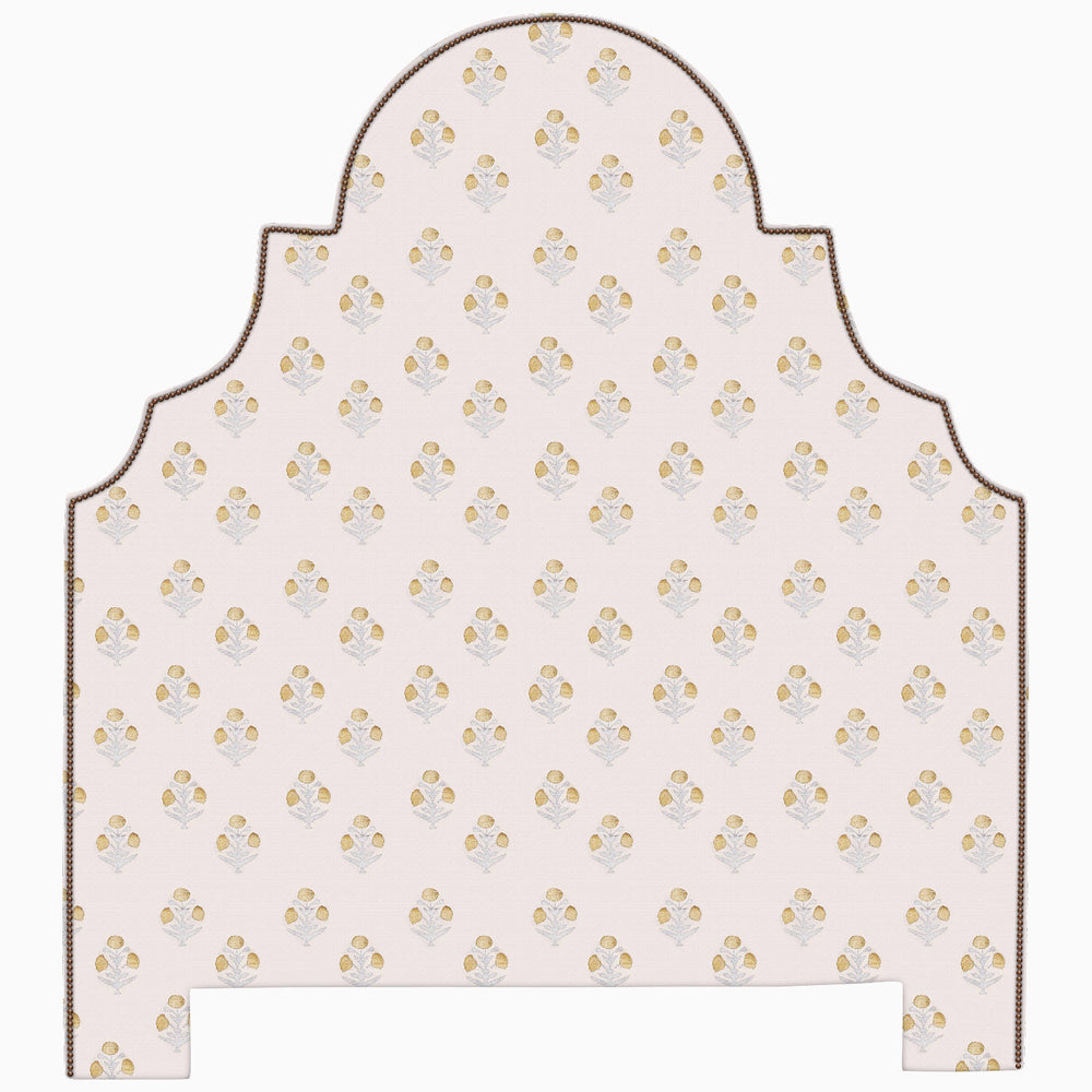A pink Custom Dara headboard with a gold floral pattern, available for shipping within the given lead time. (Brand Name: John Robshaw)