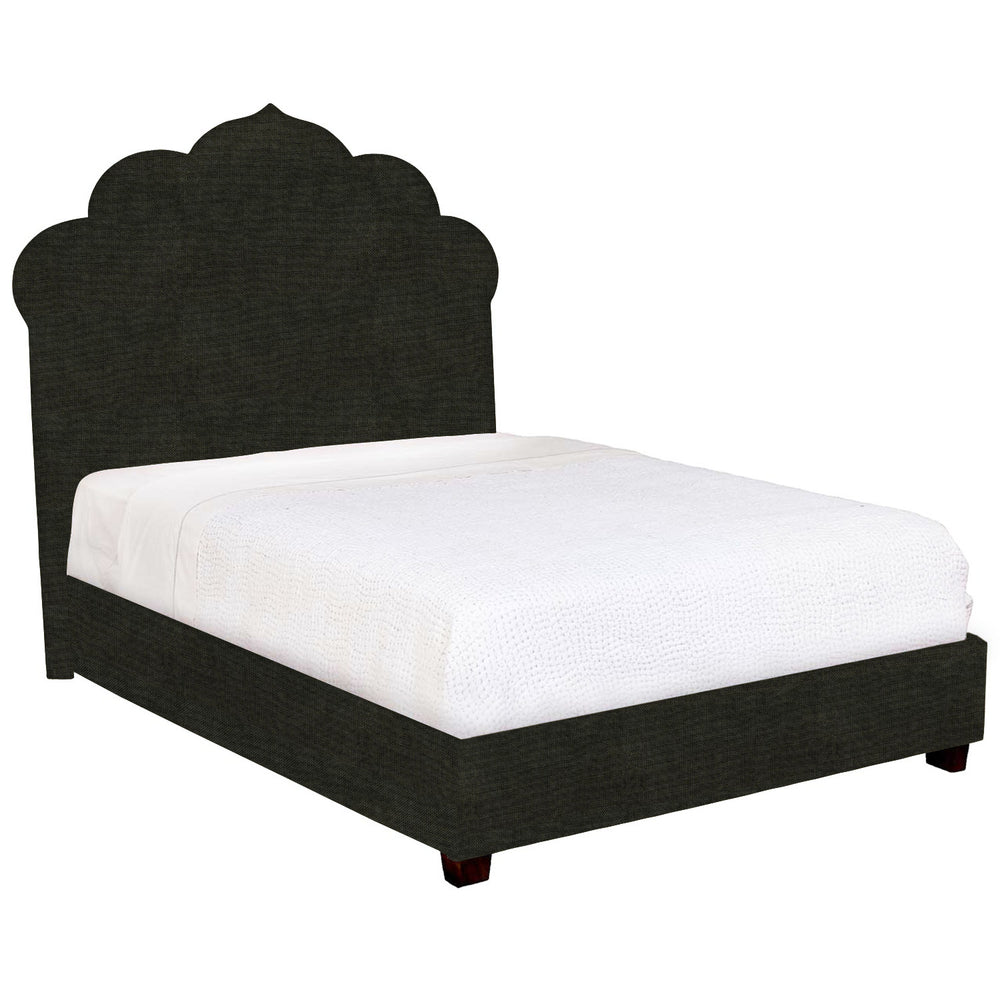 A Custom Bihar Bed from John Robshaw with a black headboard.
