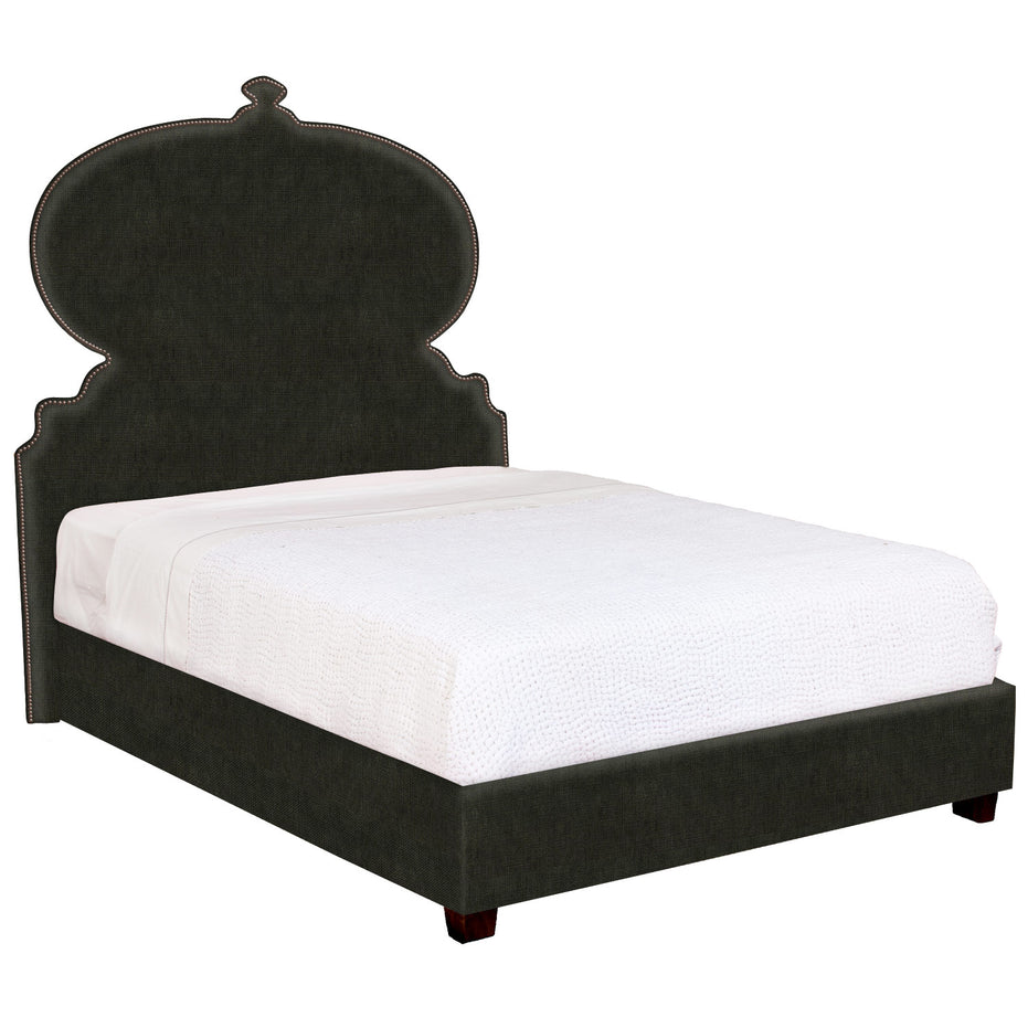 A Custom Orissa Bed with an ornate headboard available for white glove delivery.