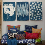 A living room with a John Robshaw Areca Palm Cyanotype couch and pillows made from recycled cotton paper. - 29053059203118