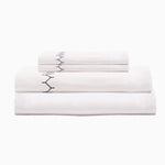 A white Stitched Ink Organic Sheets set with embroidered designs by John Robshaw. - 30273364164654