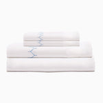 An Stitched Light Indigo Organic Sheets percale white sheet set with embroidered designs by Sheets & Cases. - 30252477775918