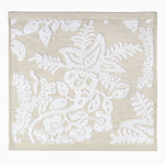 A beige and white floral-patterned Pasak Linen Bath Towel available at Pondicherry flower markets. - 30253809205294