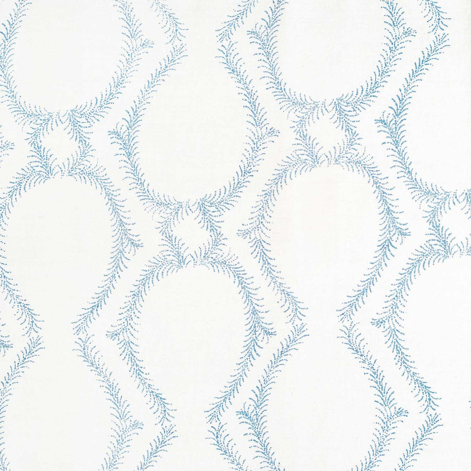 A blue and white pattern inspired by traditional craftsmanship creates a stunning design on a white background, using the Aerial Light Indigo Fabric by John Robshaw.