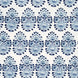A blue and white floral pattern on a white background, created through traditional craftsmanship using Lanka Lapis Fabric by John Robshaw.