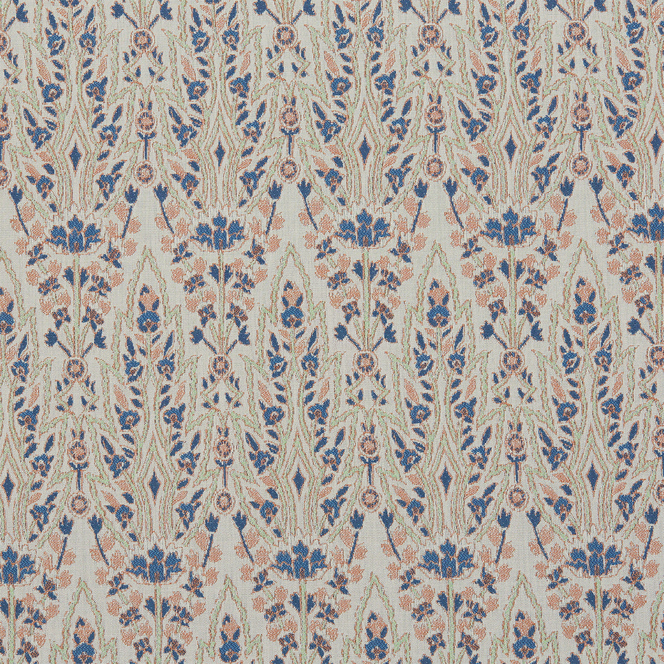 A blue and pink floral pattern reminiscent of Mughal gardens on John Robshaw's Marmar Primrose Performance Fabric.