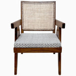 A furniture piece featuring the John Robshaw Easy Chair in Bindi Gray with a woven seat. - 29410177220654